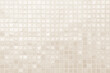 © Phokin - Cream light ceramic wall and floor tiles mosaic background in bathroom and kitchen. Design pattern geometric with grid wallpaper texture decoration pool. Simple seamless abstract surface clean.