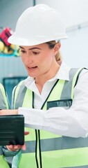 Poster - Machine, woman and discussion with tablet in factory for design review, inspection results and compliance reports. Engineers, robotics facility and online for technical manual or system configuration