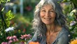 © DruZhi Art - Woman with Gray Hair Smiling in Garden, Surrounded by Flowers and Plants, Wearing Gray Shirt