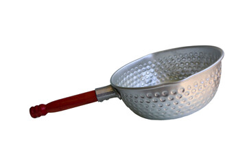 A silver pan with a wooden handle sits on a white background. The pan is empty and has a circular shape