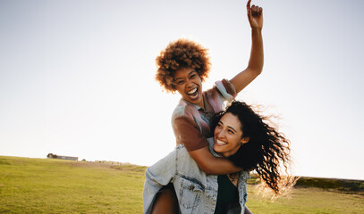 Playful friends enjoying outdoor fun and joy