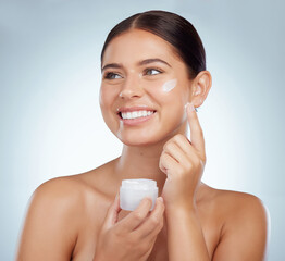 Poster - Woman, happy and cream jar for skincare in studio on grey background with routine, ingredients and satisfied for results. Body natural and Smile in confidence with facial treatment and skin lotion