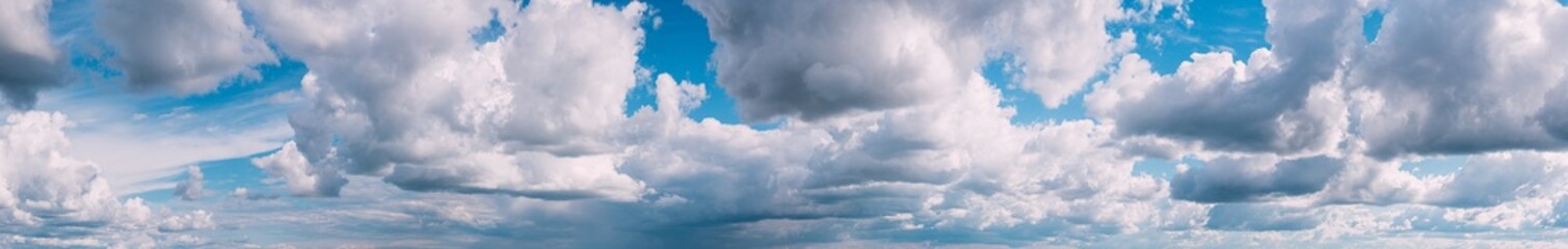 Panorama Of Cloudy Sky. Natural Day Cloudy Sky Abstract Background. Panorama Panoramic View. Backdrop. Copy Space. Bright Blue