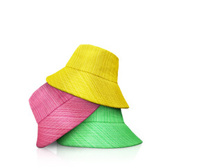 Poster - Red, yellow, green bucket hat on white background.