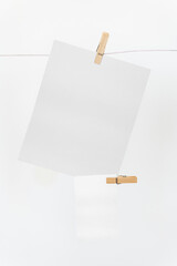 Poster - Papers mockup png hanging from a rope with paper clips