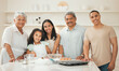 © peopleimages.com - Portrait, parents and grandparents with kid for baking in kitchen with support, learning or teaching cake recipe. Big family, girl and happy together with ingredients for cooking education or bonding