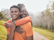 © peopleimages.com - Nature, portrait and black couple with hug for fitness, exercise and outdoor for bonding together. Happy people, man and woman with embrace for training, support and commitment for marathon goals