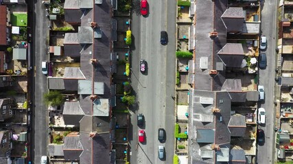 Wall Mural - Straight down aerial drone footage of the British town of Harrogate in North Yorkshire England east of the Yorkshire Dales in the summer time showing rows of terrace houses from above