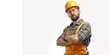 © vefimov - A male construction worker in a hard hat and tool belt posing for the camera.