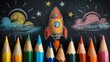 © Creative_Bringer - Colored pencils arranged with a chalkdrawn rocket on a blackboard, creative and playful education theme