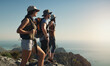 © ReeseBuyout1/peopleimages.com - Hiking, mountain and friends on cliff outdoor of fitness travel, adventure view and backpack journey in summer. People, backpacking and trekking together for cardio exercise, rock climbing and health