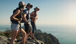 © peopleimages.com - Mountain, hiking and friends on cliff outdoor of fitness travel, adventure view and backpack journey. People, backpacking and trekking together for cardio exercise, rock climbing and health in summer