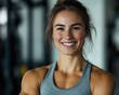 © Serhii - Athlete Headshot. Happy Female Portrait in Gym After Fitness Workout for Health and Wellness