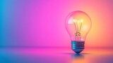 A glowing light bulb with a colorful gradient background, symbolizing the birth of a smart idea in business