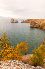 Wall Mural - baikal lake on october. view of famous shamanka rock - natural landmark of olkhon island. scenic aut