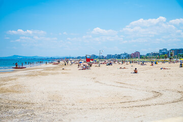 Wall Mural - A view along the beach at Rimini, Italy in summertime