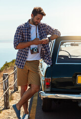 Poster - Man, road trip and online with smartphone by car for navigation app, checking route and directions for journey. Person, happy and camera for travel documentation, adventure and internet for research.