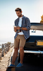 Poster - Man, road trip and online with mobile by car for navigation app, checking route and directions for journey. Male person, happy and camera for travel documentation, adventure and internet for research