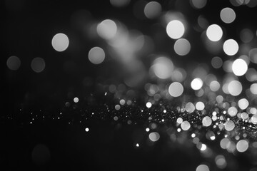 blurred silver bokeh on black background