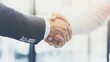 © Helen - Business Partnership Handshake