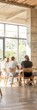 © Ryzhkov - Diverse College Dormitory Common Area with Students Studying, Interacting, and Playing Games in a Warm, Inviting Atmosphere