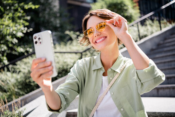 Canvas Print - Photo of charming cheerful lovely girl popular influencer making selfie lifestyle blog enjoying free time weekend outside