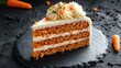 © fivan - A slice of vibrant orange carrot cake with cream cheese frosting, sitting on a dark charcoal concrete surface, with a few carrot decorations for accent