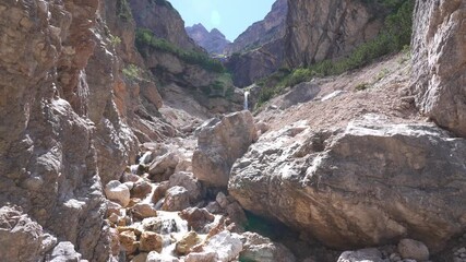 Wall Mural - small waterfalls near lake braies in trentino alto adige italy