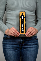 Wall Mural - idea. pointing arrow with text. women's health and wellness concept