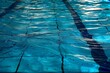 © Iftikhar alam - Shimmering blue water in a competition pool with a distinct line dividing lanes, Lanes of shimmering blue water in a competition pool