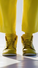 Wall Mural - A person wearing yellow shoes and pants standing on a white floor, AI