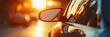 © Matthias - Transportation banner with close-up of car's side-view mirror reflecting sunset, soft shadows, space for text at the top