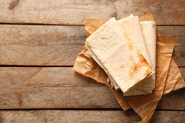 Wall Mural - Fresh lavash on wooden background