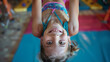 © Mahemud - Happy girl during corrective gymnastics.