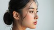 © Vilaphon  - Side view of Beautiful young asian woman with clean fresh skin on white background