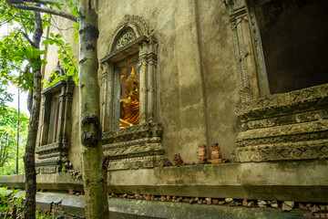 Buddha statue in decadent chapel at Sangkhla Buri Kanchanaburi,Thailand