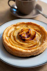 French fresh baked sweet puff pastry with fresh apple fruits in sirup  in confectionery shop