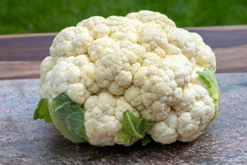 Wall Mural - Healthy vegetarian food concept, raw cauliflower white cabbage ready for cooking