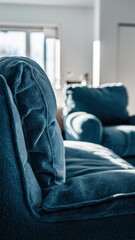 Wall Mural - A close up of a blue chair and couch in the living room, AI