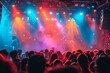 © denklim - Colorful Light Show Illuminating a Packed Concert Venue at Night