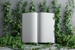 © NikahGeh - Open book with blank pages in front of a concrete wall overgrown with climbing ivy plants