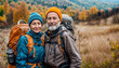 © Olga Che - Senior couple hike. Two old happy people walk. Autumn nature with mature woman and man hiking together. Healthy active family lifestyle. Sport travel in autumn mountain landscape. Outside adventure