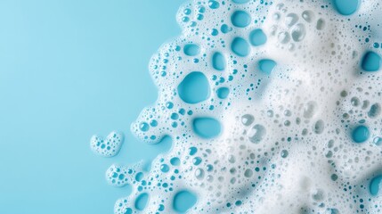 Poster - Foamy bubbles create a whimsical pattern on a soft light blue surface, highlighting cleanliness
