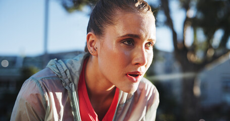 Wall Mural - City, tired and rest of woman for fitness, exercise and break after running in marathon challenge. Outdoor, female person or runner with fatigue from workout, wellness and thinking of goal in nature