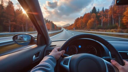 Driving a Car Through a Scenic Fall Foliage Highway