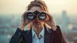 © PicTCoral - A Businesswoman Uses Binoculars, Scanning The Horizon With Determination