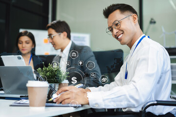 Wall Mural - Businessmen team or financial data analysts working with tablets and laptop computers and data graphs together. Plan to analyzing projects in the office.