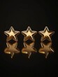 © Alexander Chaykin - Three gold stars on a black surface