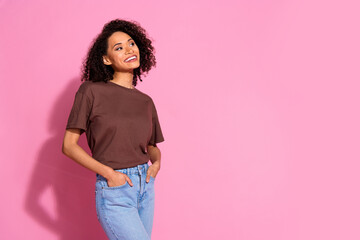 Sticker - Photo of nice young girl look empty space wear brown t-shirt isolated on pink color background