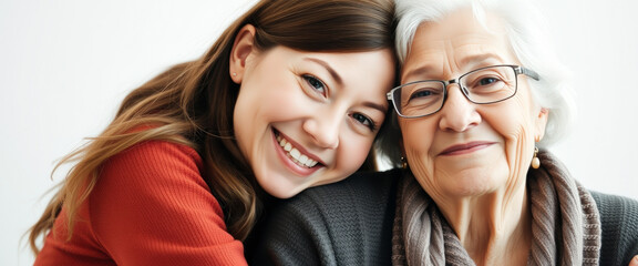 Canvas Print - Close-up Portrait of a Young Woman and Her Grandmother, Smiling and Hugging Each Other